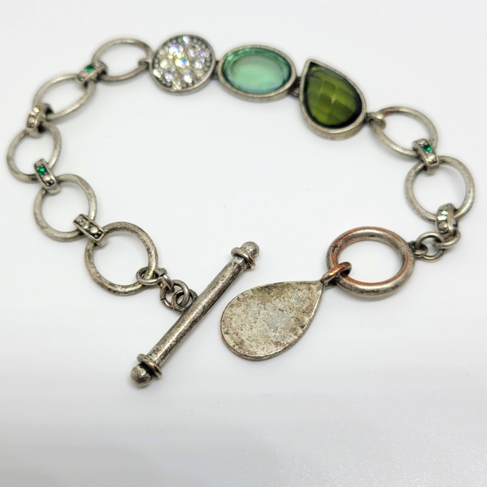 Lia Sophia Toggle Bracelet in silver tones with green toned stones.